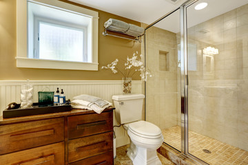 Modern bathroom interior with glass door shower