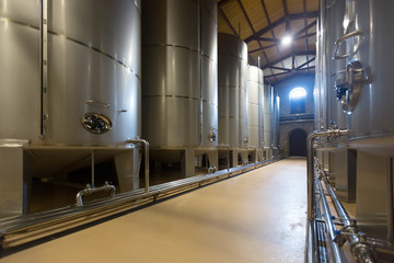  large stell barrels in winery