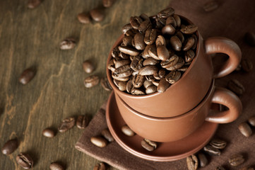 Coffee beans in cup