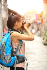 Foto op Canvas woman photographer/tourist taking photo in guilin,china  © lzf