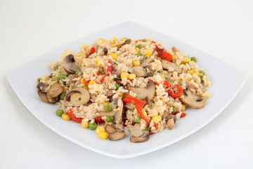 rice with vegetable on white plate