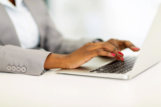 African Businesswoman Hands Working On Laptop