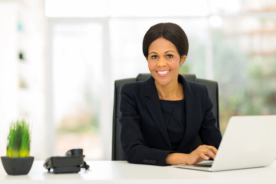 mature afro american business woman using computer