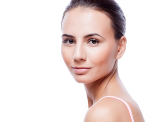 Beautiful face of young adult woman with clean fresh skin - isol