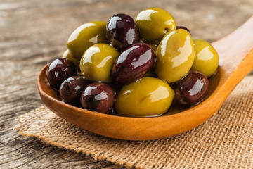 Varitey olives wooden spoon