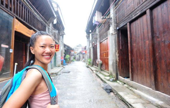 woman tourist at xingping ancient town in guilin ,china 
