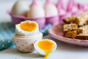 Opened boiled blue duck egg with soft yolk