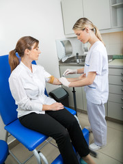 Businesswoman Undergoing Blood Test