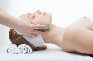 Obraz na płótnie Canvas Beauty and relaxation concept, attractive woman in spa salon lyi