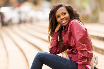 Fototapeta premium african woman relaxing in urban city