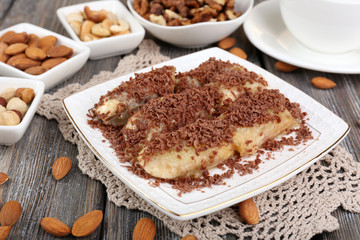 Sweetened fried banana on plate, close-up