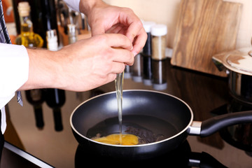 Man cooking in kitchen at home
