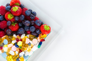 Healthy lifestyle, Fruit and pills, vitamin supplements