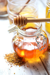 Fresh honey on wooden table