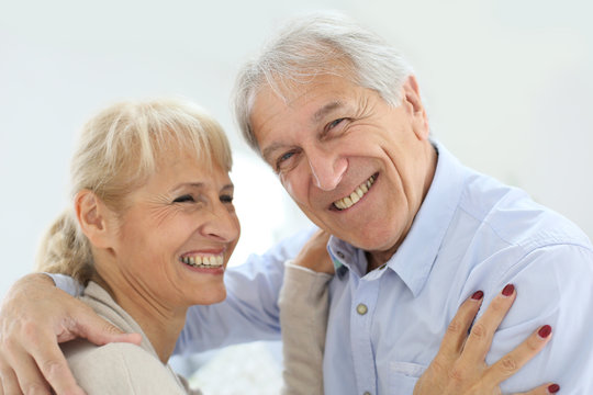 Cheerful senior couple laughing outloud