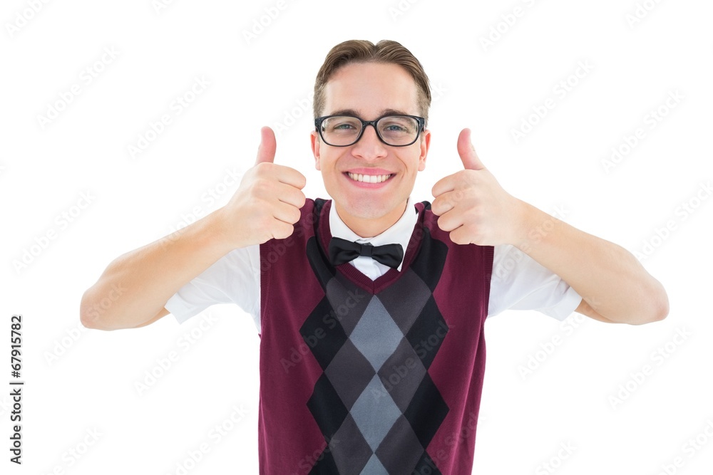 Poster Smiling geeky hipster looking at camera showing thumbs up