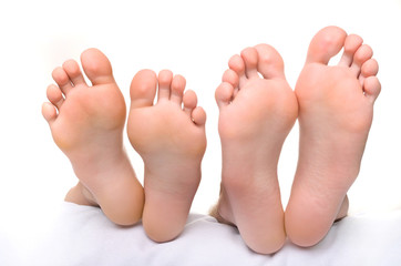 Female legs and male legs.