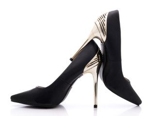 Sexy black shoes with high gold heels on white background - obrazy, fototapety, plakaty