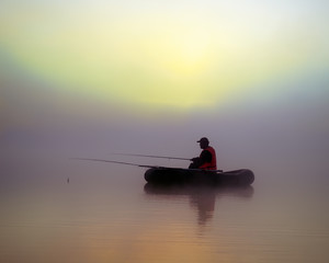 The fishermen on the boat in the fog