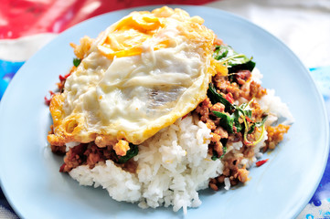 stir fried minced pork and chili ,basil served with steamed rice