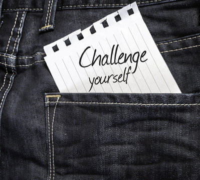 Challenge Yourself written on a peace of paper
