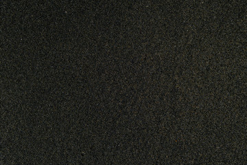 Black sand, closeup texture