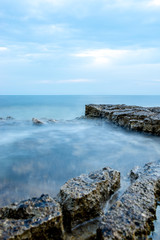 Fototapeta na wymiar Nautical background with a rocky seashore