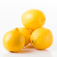 ripe lemons on a white background 