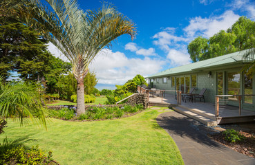 Fototapeta premium Home with grassy lawn