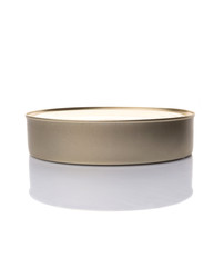 Oval shaped tin can over white background 