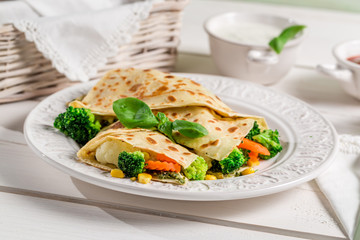 Pancake with vegetables and three sauces