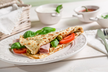 Pancake with vegetables and ham