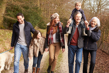 Multi Generation Family On Countryside Walk