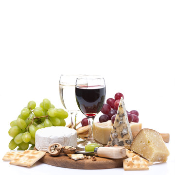 Two Glasses Of Wine, Grapes, Cheese And Crackers, Isolated