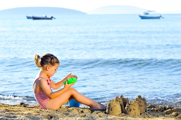 Toddler girl at beach