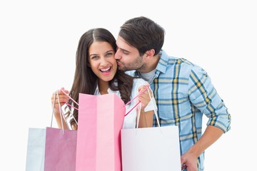 Attractive young couple with shopping bags