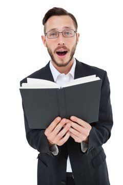 Young Preacher Reading From Bible