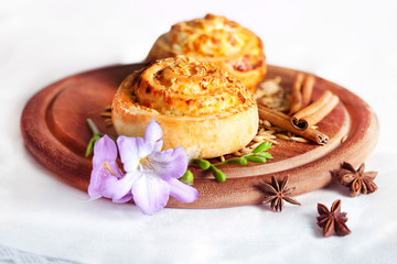 bun with cinnamon on board