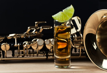 saxophone and tequila with lime