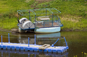 Old river pontoon boat