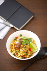 thai spicy fish and rice fried in white dish