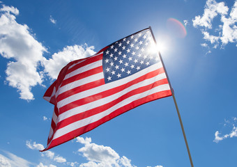 Obraz premium USA flag on blue sky background