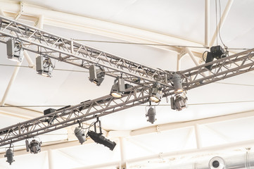 bright lighting rig inside a large marquee venue