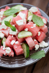 Watermelon cubes, cucumber and feta cheese salad, close-up