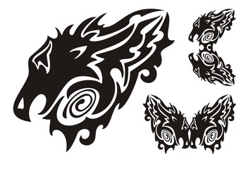 Obraz premium Tribal dragon head and twirled dragons symbols