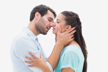 Attractive young couple about to kiss