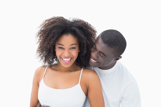 Attractive Couple In Matching Clothes Smiling At Camera