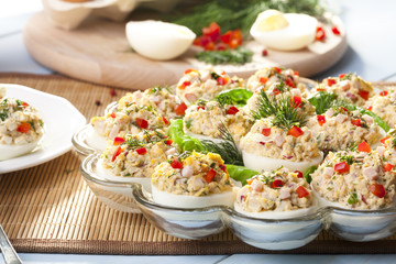 stuffed eggs with ham, red pepper and dill