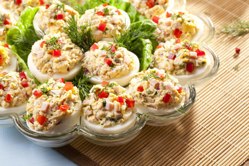 stuffed eggs with ham, red pepper and dill