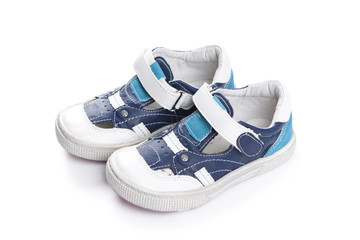 Children's shoes isolated over the white background
